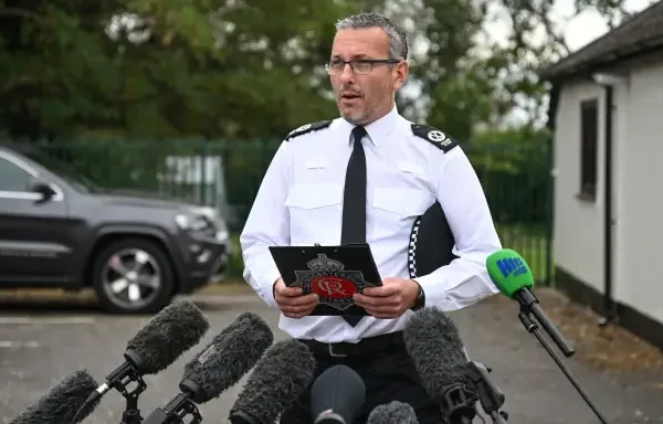 Gloucestershire Constabulary assistant chief constable Richard Ocone speaks to the media near RAF Fairford base in Fairford, south-west England on September 27, 2026, as UK counter-terrorism police investigate an incident near the base in the village of Whelford. British police on September 27 declared a major incident and evacuated villagers living near a base used by the US air force after arresting several men on suspicion of explosives offences. (Photo by JUSTIN TALLIS / AFP)