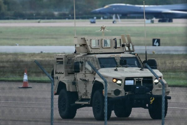 An armoured vehicle patrols the interior at RAF Fairford base, southwest England