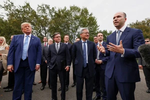 US President Donald Trump, with US House Speaker Mike Johnson (R-LA), Nvidia President and CEO Jensen Huang and OpenAI President Greg Brockman, speaks to the media at the White House driveway following a luncheon for tech leaders in the East Room, in Washington, DC, US, September 29, 2026.