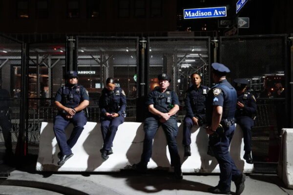 New York City police officers are on duty outside the Lotte Palace Hotel during a United Nations General Assembly leaders reception, late Tuesday, Sept. 22, 2026, in New York. (AP Photo/Julia Demaree Nikhinson)