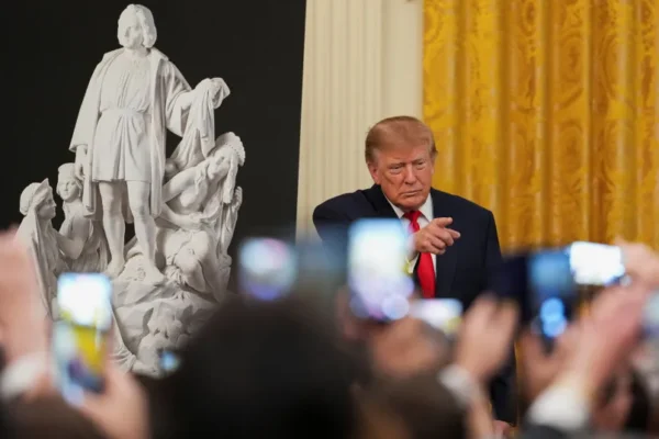 US President Donald Trump gestures during a Columbus Day celebration in the East Room of the White House in Washington, DC, US, October 9, 2026.