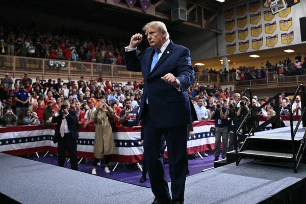 TOPSHOT - US President Donald Trump dances during a campaign rally in Vandalia, Ohio, on October 3, 2026. (Photo by Brendan SMIALOWSKI / AFP via Getty Images)