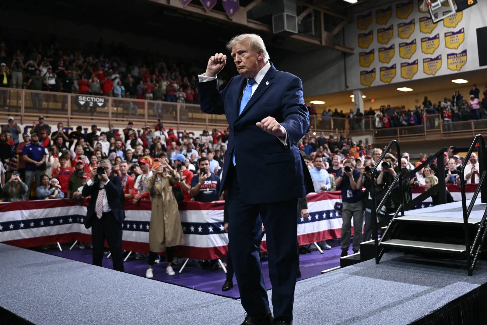 TOPSHOT - US President Donald Trump dances during a campaign rally in Vandalia, Ohio, on October 3, 2026. (Photo by Brendan SMIALOWSKI / AFP via Getty Images)