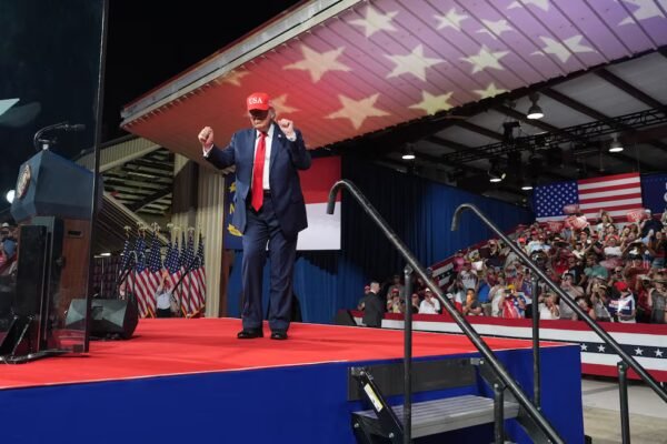 President Donald Trump dances after speaking at a rally at Gastonia Municipal Airport,...