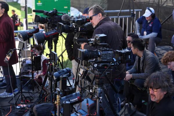 Television networks set up before President Donald Trump, first lady Melania Trump, China's...