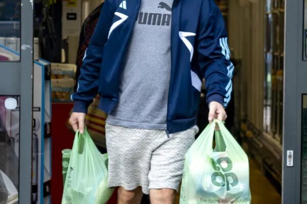 Mohammed Yaseen, visiting a Co-op store near his bail hostel in Old Windsor. Yaseen has a criminal past in Germany and is applying for asylum in UK despite known ISIS connections in his past.