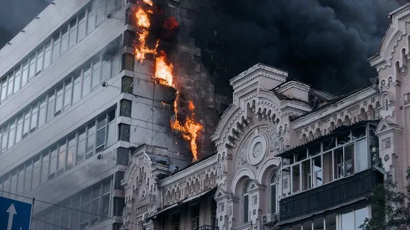 KYIV, UKRAINE - SEPTEMBER 28: The building of the private medical clinic Dobrobut burns following a second Russian drone strike on central Kyiv, approximately one hour after a projectile hit a residential building in the city center on September 28, 2026 in Kyiv, Ukraine. The strike came shortly after separate drone strike on the Academy of Sciences building in Kyiv's historic center. (Photo by Nikoletta Stoyanova/Getty Images)