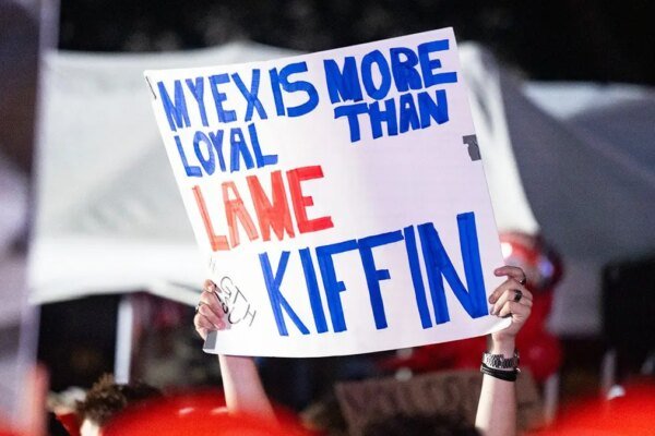 A sign is seen at ESPN College GameDay in The Grove in Oxford, Miss.